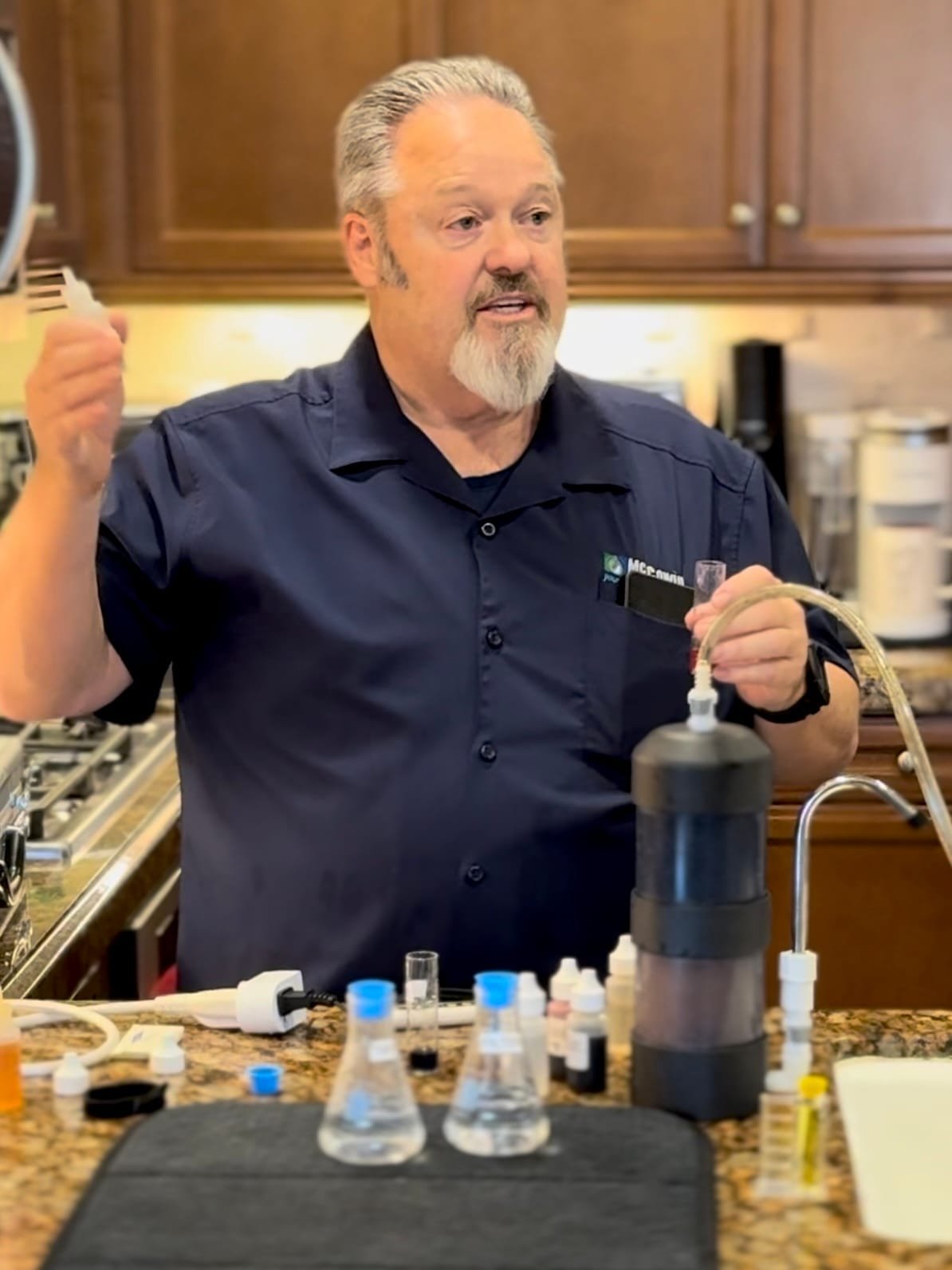 An advanced residential water filtration system installed under a kitchen sink, ensuring clean and safe drinking water for a modern Orange County home.