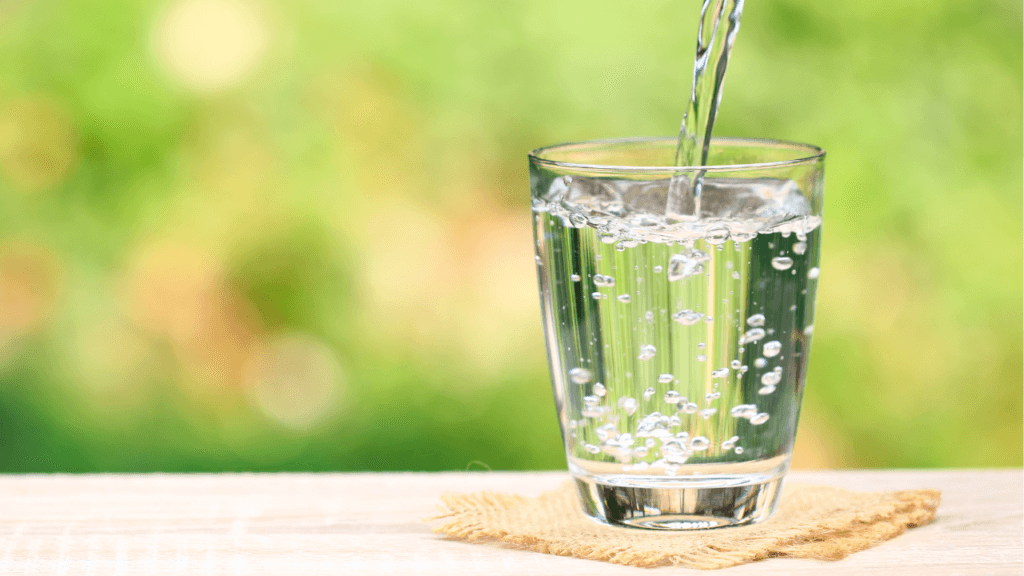 A sophisticated whole house water filter system installed in a residential utility room enhances water quality for the entire home.