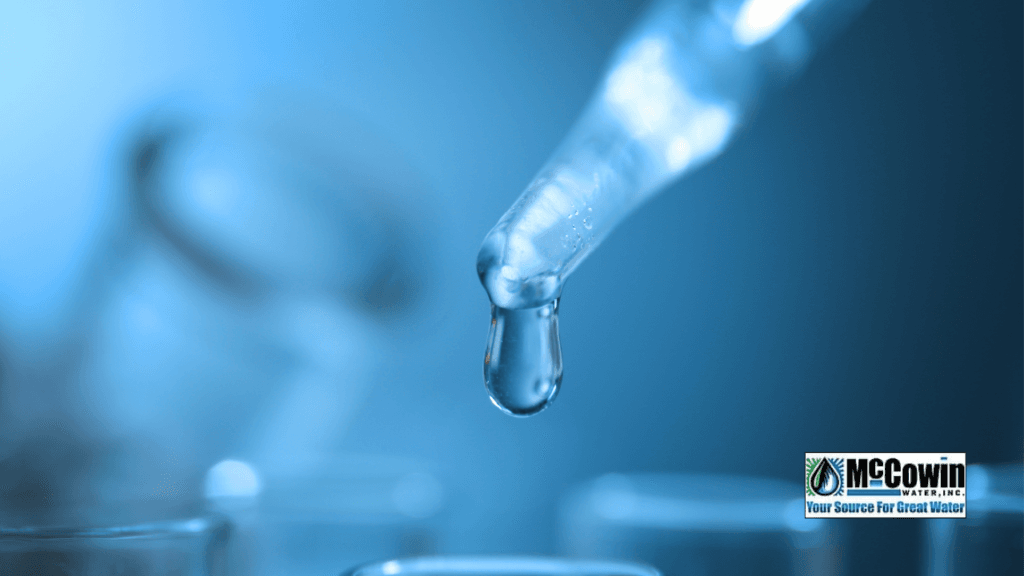 Assessment of users perception on the quality of the water they drink Close-up of a water droplet from a pipette, symbolizing precision water testing and high water quality.
