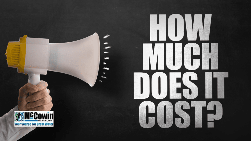 The Hidden Price of Hard Water: What You Need to Know About Water Softener Cost Hand holding megaphone with “How Much Does It Cost?” text overlay, localized for McCowin Water in Irvine, CA; explaining water softener cost.