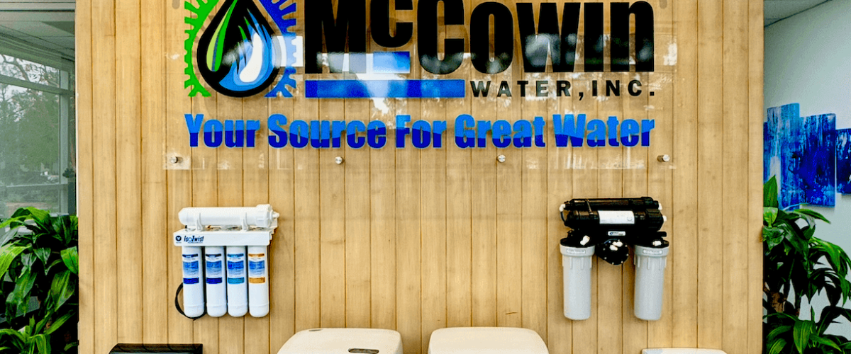 Interior view of McCowin Water showroom in Irvine, California, displaying advanced home water filtration systems and reverse osmosis solutions.