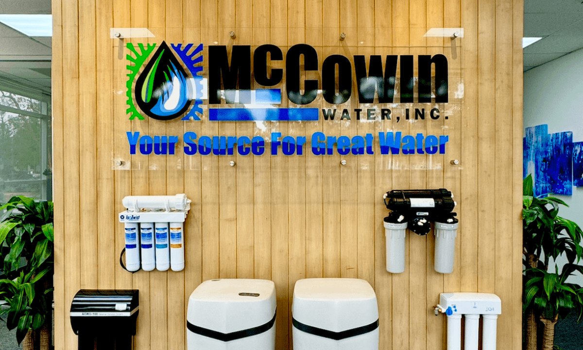 Interior view of McCowin Water showroom in Irvine, California, displaying advanced home water filtration systems and reverse osmosis solutions.