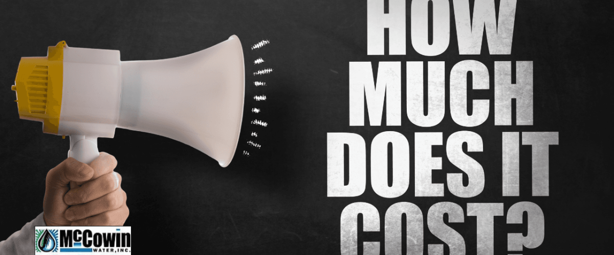 Hand holding megaphone with “How Much Does It Cost?” text overlay, localized for McCowin Water in Irvine, CA; explaining water softener cost.